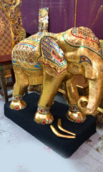 wooden elephant worship Phra Phrom at Erawan Shrine BKK. (praprom)